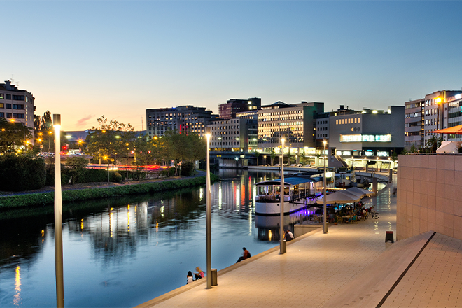 a river in an urban environment, evening atmosphere